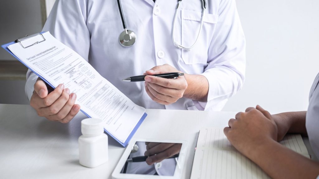 Doctor discussing sleep apnea results with patient
